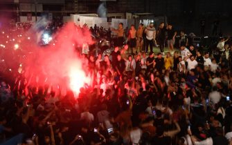 Napoli's supporters celebrate after winning the Italy Cup Final soccer match against Juventus FC, played at the Olimpico stadium of Rome, in the centre of Naples, Italy, 17 June 2020.   ANSA/CIRO FUSCO